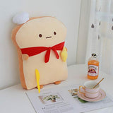 Peluche de pan con bufanda roja