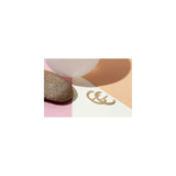 Aretes tipo dormilona chapados en oro de 14 quilates