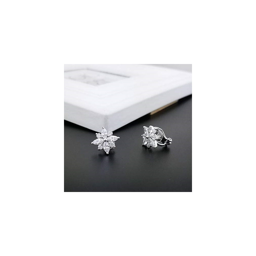 Aretes de clip con forma de copo de nieve para mujeres