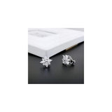 Aretes de clip con forma de copo de nieve para mujeres