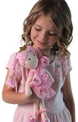 Muñeca de peluche con diente de princesa rosa