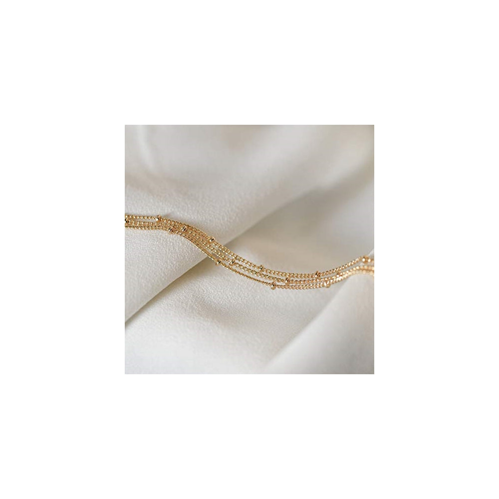 Pulseras y tobilleras de perlas pequeñas dorada