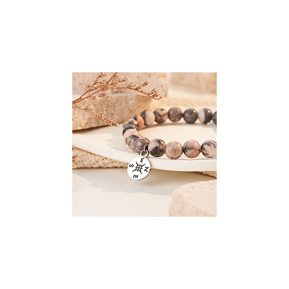 Pulseras y tobilleras de graduación brujula rosa