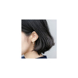Aretes de plata con diseño de estrella para mujer