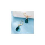 Aretes con dijes chapados en oro con forma de lágrima