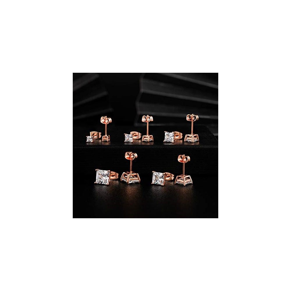 Aretes  chapados en oro blanco de 18 quilates con circonita