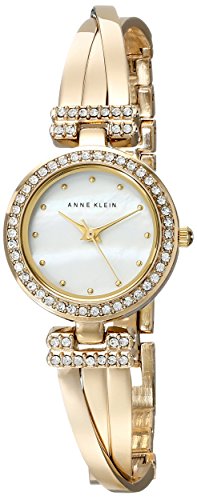 Conjunto de reloj y brazalete en tono dorado para mujer