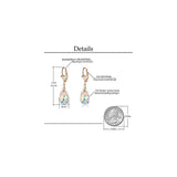 Aretes con dijes chapados en oro con forma de lágrima