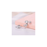 Aretes de plata con diseño para mujeres