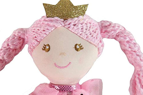 Muñeca de peluche con diente de princesa rosa