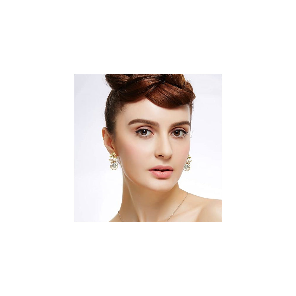 Aretes colgantes de oro de 18 quilates con perlas grandes