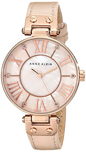 Reloj para mujer en tono dorado rosa con correa de cuero
