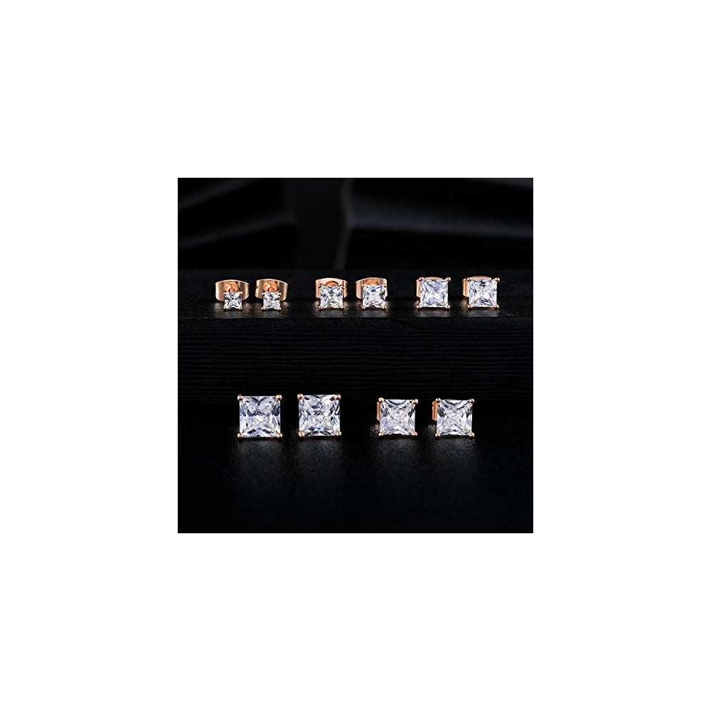 Aretes  chapados en oro blanco de 18 quilates con circonita