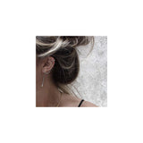 Aretes de plata con borla para mujer