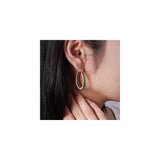 Aretes colgantes de argolla con varilla de plata