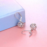 Pendientes colgantes de plata con forma de corazón