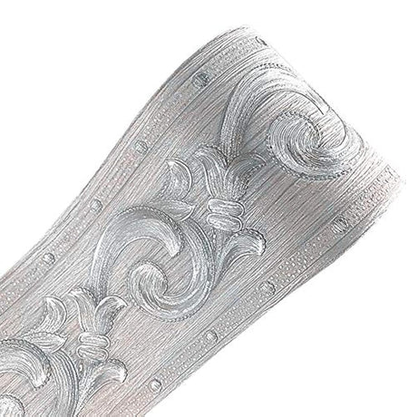cenefa autoadhesivos, diseño de flores 3D plateadas.