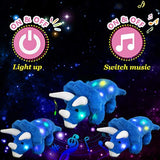 Dinosaurio de peluche con luz musical