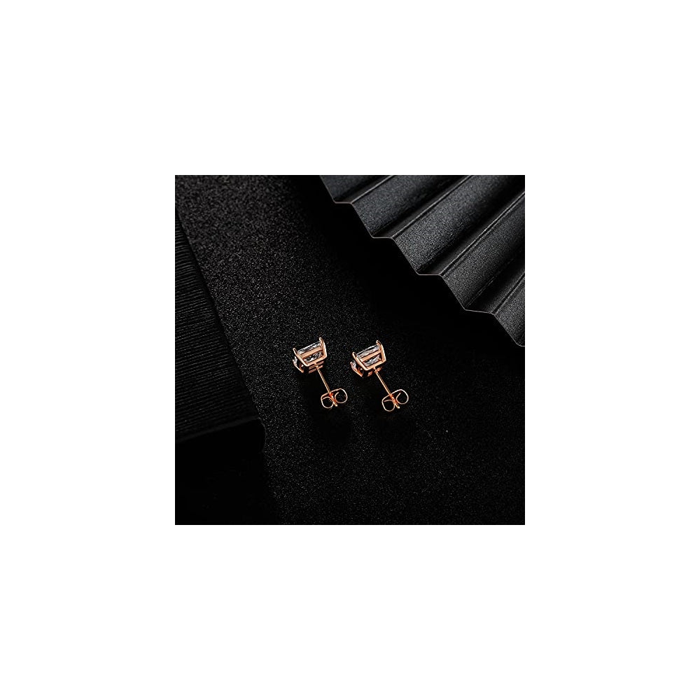 Aretes  chapados en oro blanco de 18 quilates con circonita