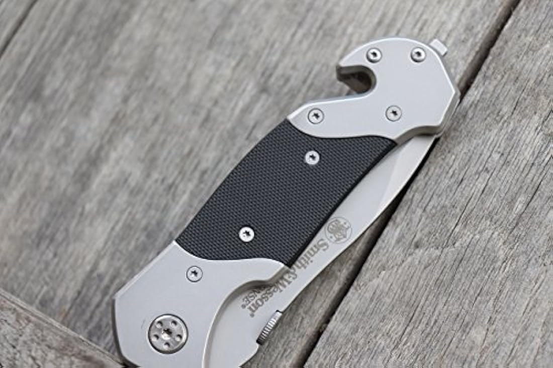 cuchillo plegable con traba, hoja parcialmente dentado