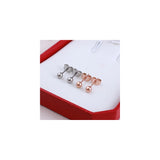Aretes de tuerca redondos pulidos para mujer