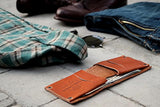 Billetera plegable de piel para hombre