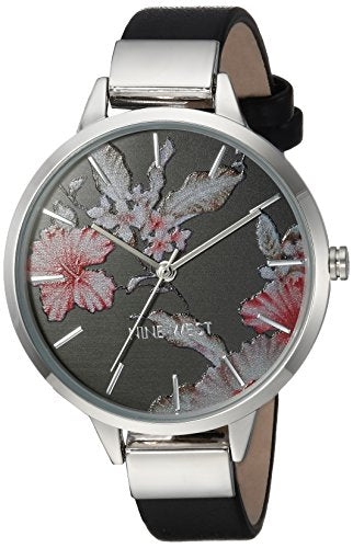 Reloj para mujer con correa plateada y negra.