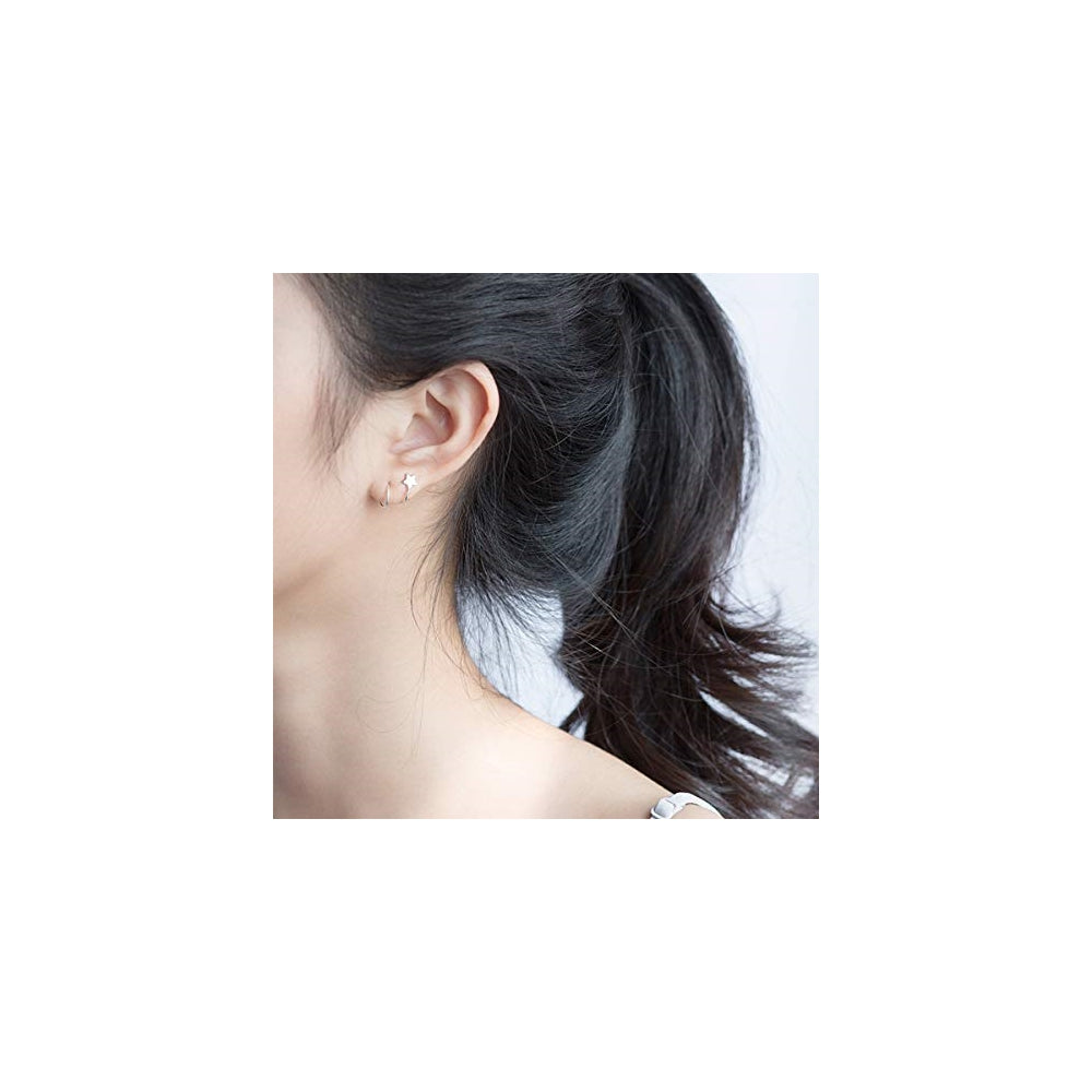 Aretes de plata con diseño de estrella para mujer