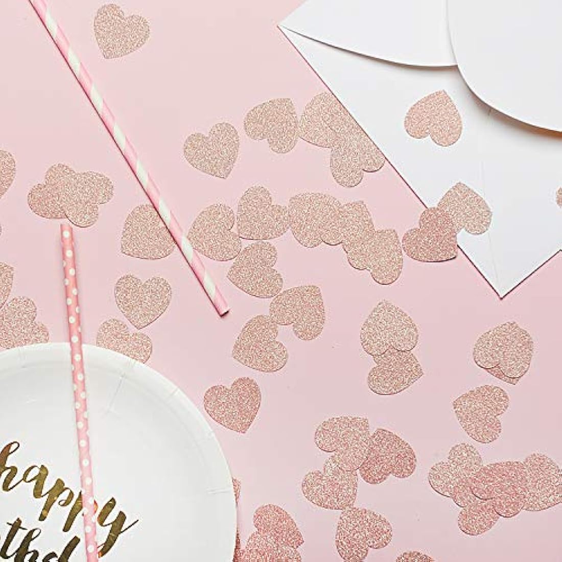 Confeti de papel con purpurina en forma de corazón