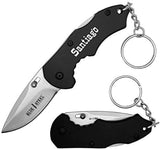 Cuchillo de bolsillo con llavero y mango de color negro