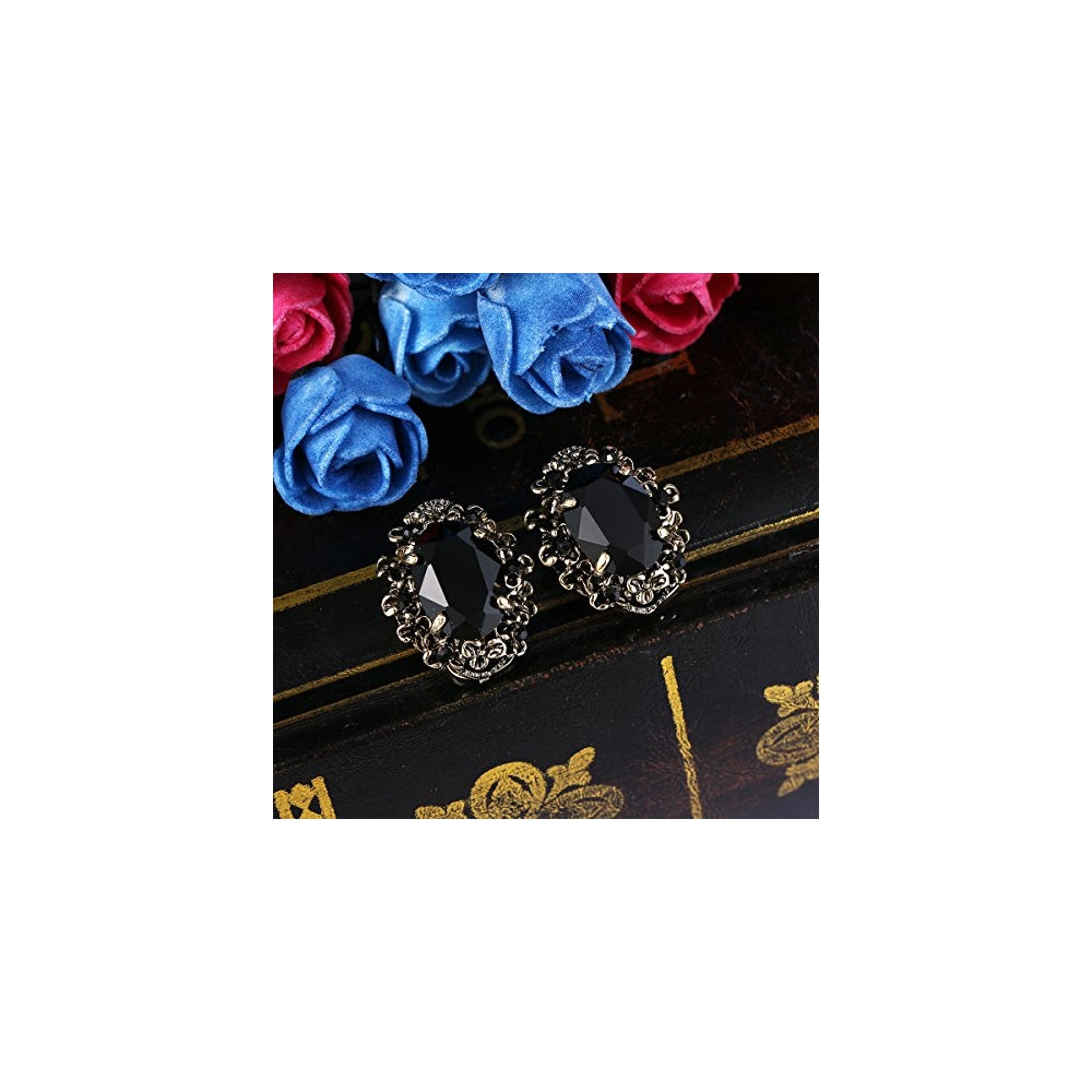 Aretes de clip ovalados estilo victoriano con diseño