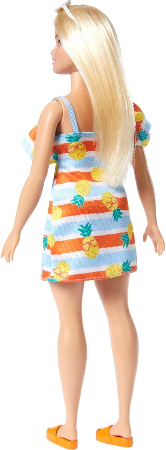 Barbie Muñeca Amante del Océano con Vestido Floral y Accesorios