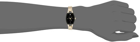 Reloj de pulsera con malla dorada  esfera dorada y diamantes