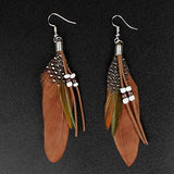Pendientes de plumas lindos  hechos a mano