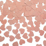 Confeti de papel con purpurina en forma de corazón