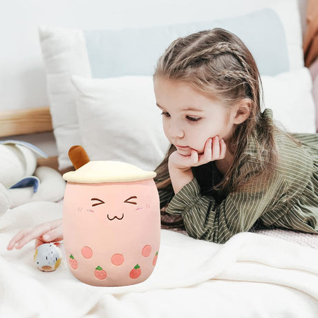Peluche de personaje de caricaturas rosada forma taza