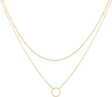 Collar con dije en forma de corazón en niveles delicado