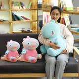 Peluches de dinosaurio rosado