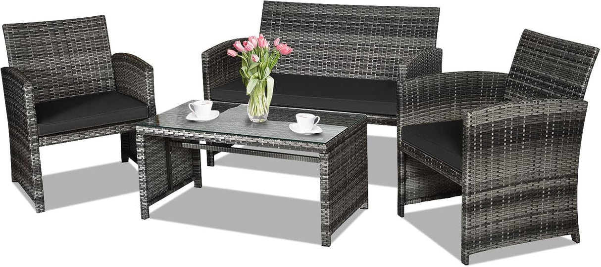 Goplus Juego de muebles de ratán de 4 piezas, sofá de conversación de mimbre para exteriores con cojines resistentes a la intemperie y mesa de vidrio templado para césped, patio, piscina, jardín (negro)