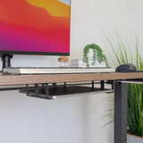 Soporte para computadora portátil debajo del escritorio