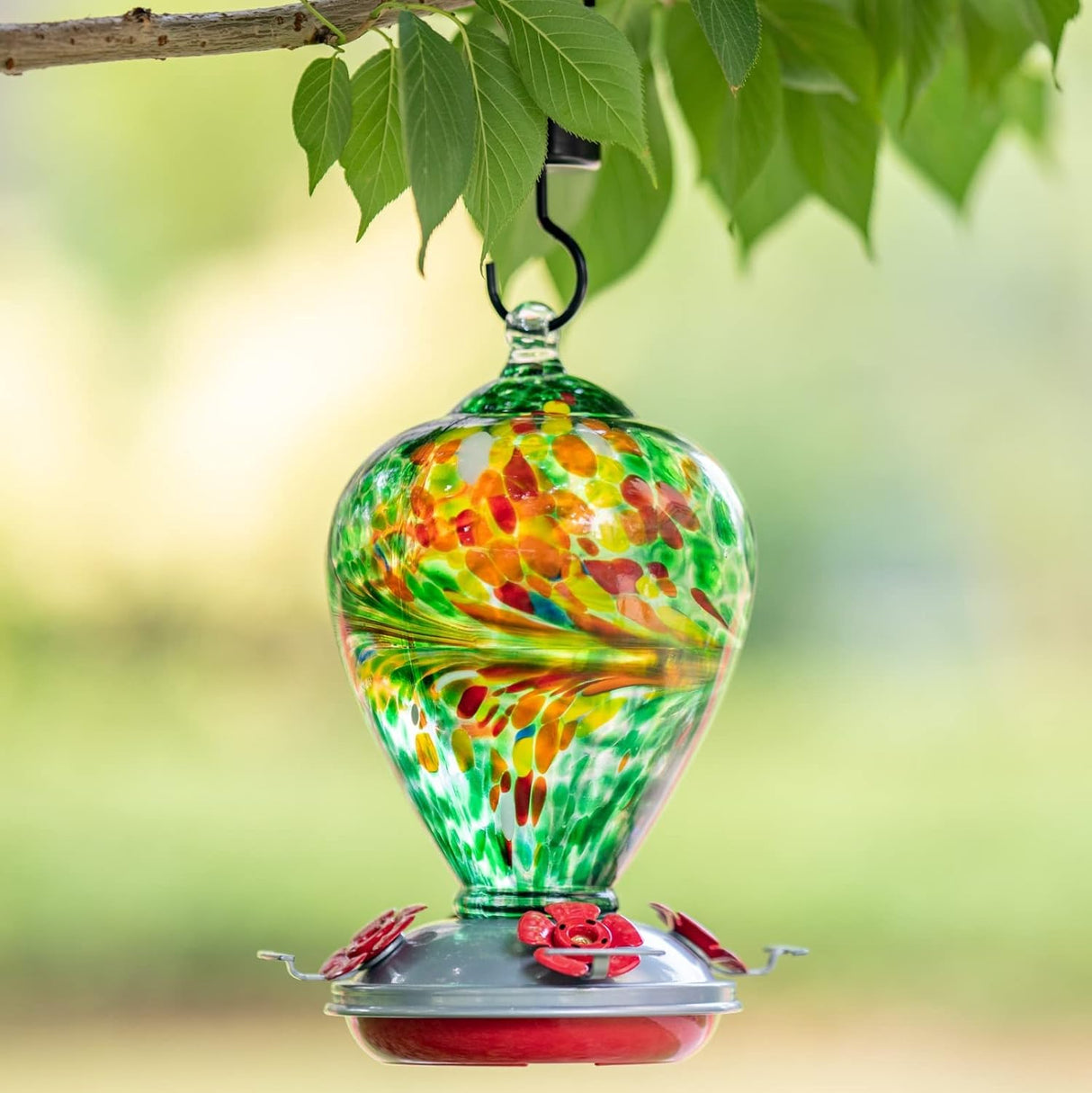 Muse Garden - Comedero para colibríes para exteriores vidrio soplado a mano, 34 onzas, foso de hormigas incluido, Peacock