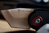 Cuchillo plegable de alto carbono con hoja Tanto y mango G10