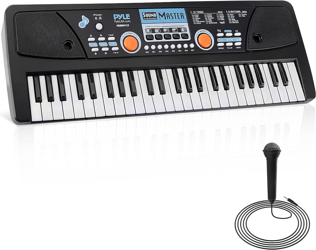 Teclado de piano portátil y micrófono