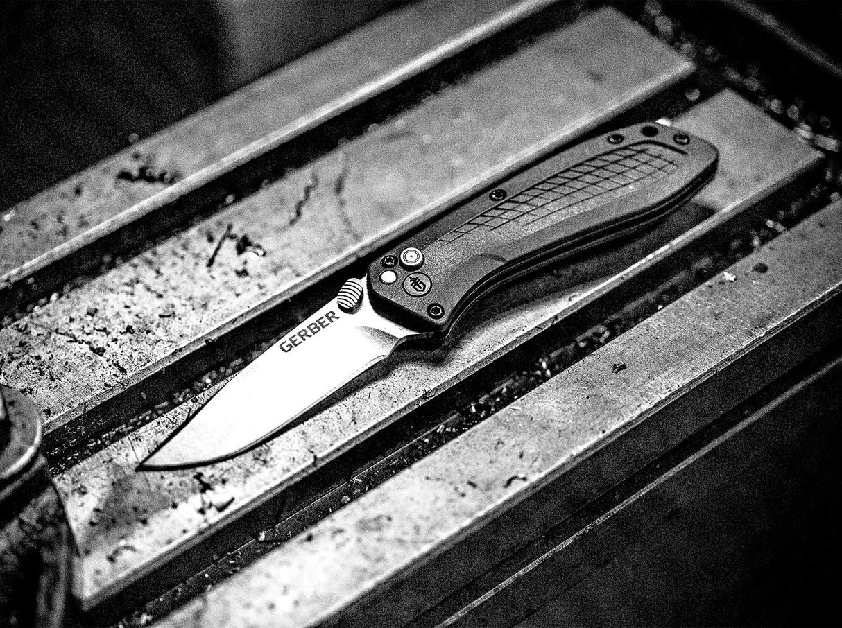 Cuchillo de transporte diario con apertura asistida
