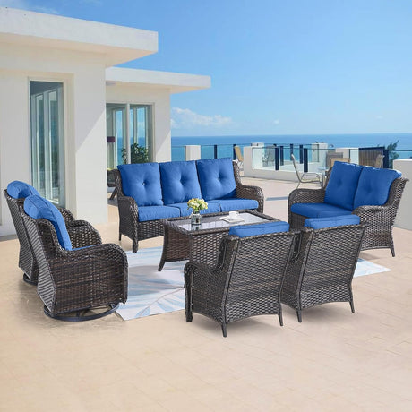 Belord Juego de muebles de mimbre para exteriores, 7 piezas de muebles de patio trasero, juegos de conversación de ratán marrón con sillas mecedoras giratorias, sofá de ratán, sillas de club y mesa auxiliar, cojín azul