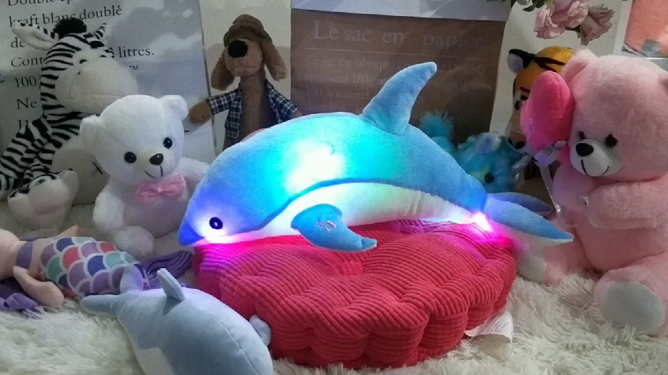 Delfín musical de peluche con luces LED