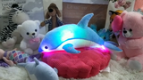 Delfín musical de peluche con luces LED
