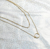Collar con dije en forma de corazón en niveles delicado