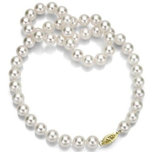 Conjunto de collar y pendientes de perlas y oro