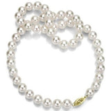 Conjunto de collar y pendientes de perlas y oro